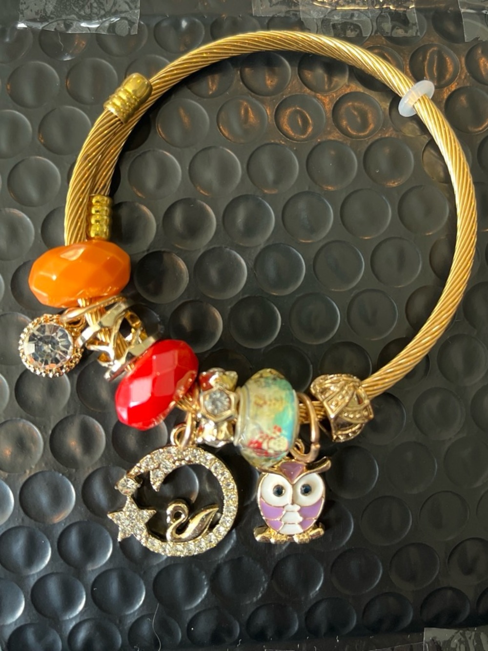 Gold Tone Charm Bangle Bracelet with Red, Orange and Multicolor Beads